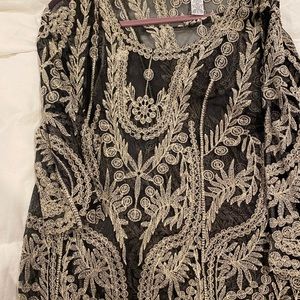 Black and gold sparkly blouse